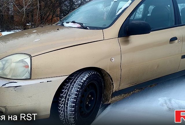 Бежевий Кіа Ріо, об'ємом двигуна 1.3 л та пробігом 200 тис. км за 1700 $, фото 6 на Automoto.ua