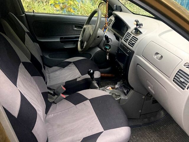 Бежевий Кіа Ріо, об'ємом двигуна 1.4 л та пробігом 201 тис. км за 4500 $, фото 7 на Automoto.ua