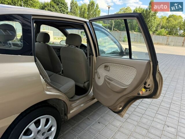 Бежевий Кіа Ріо, об'ємом двигуна 1.34 л та пробігом 134 тис. км за 3999 $, фото 61 на Automoto.ua