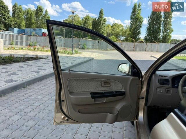 Бежевий Кіа Ріо, об'ємом двигуна 1.34 л та пробігом 134 тис. км за 3999 $, фото 39 на Automoto.ua