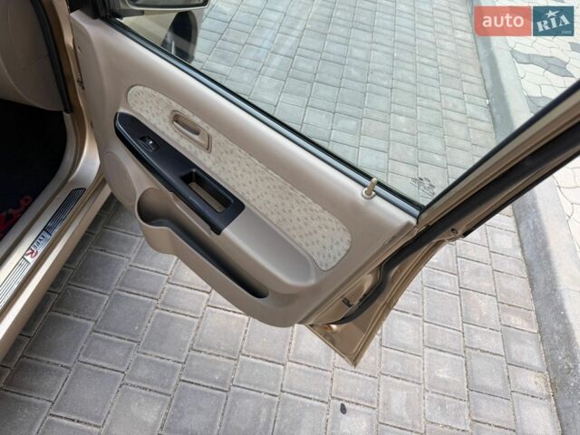 Бежевий Кіа Ріо, об'ємом двигуна 1.34 л та пробігом 134 тис. км за 3999 $, фото 51 на Automoto.ua
