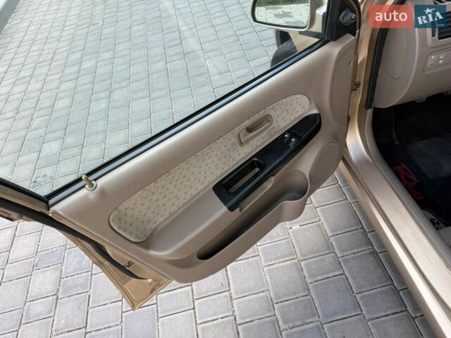 Бежевий Кіа Ріо, об'ємом двигуна 1.34 л та пробігом 134 тис. км за 3999 $, фото 40 на Automoto.ua