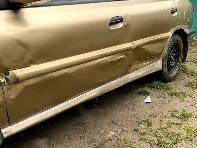 Бежевый Киа Рио, объемом двигателя 1.3 л и пробегом 267 тыс. км за 2500 $, фото 5 на Automoto.ua