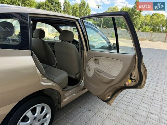Бежевий Кіа Ріо, об'ємом двигуна 1.34 л та пробігом 134 тис. км за 3999 $, фото 61 на Automoto.ua