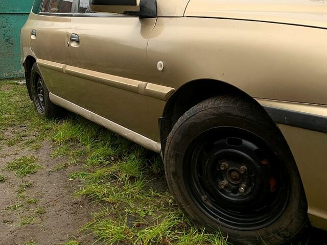 Бежевый Киа Рио, объемом двигателя 1.3 л и пробегом 267 тыс. км за 2500 $, фото 2 на Automoto.ua