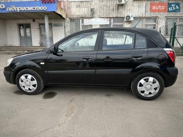 Черный Киа Рио, объемом двигателя 1.4 л и пробегом 233 тыс. км за 5900 $, фото 43 на Automoto.ua