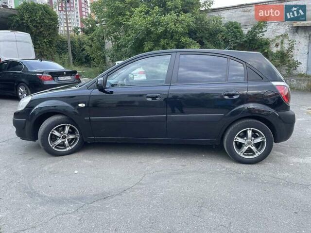 Черный Киа Рио, объемом двигателя 1.4 л и пробегом 265 тыс. км за 3900 $, фото 5 на Automoto.ua