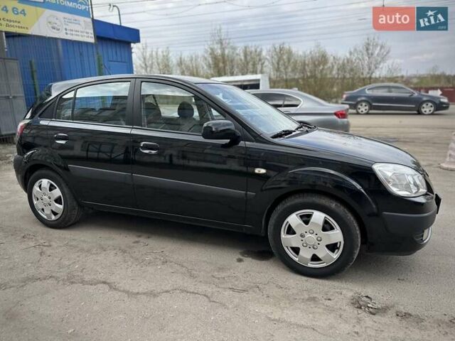 Черный Киа Рио, объемом двигателя 1.4 л и пробегом 233 тыс. км за 5900 $, фото 40 на Automoto.ua