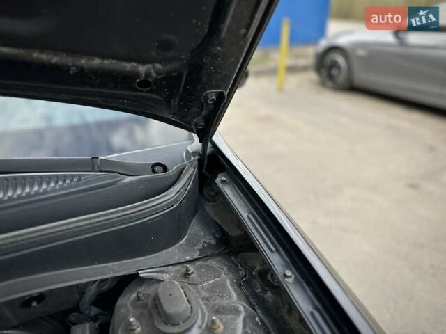Черный Киа Рио, объемом двигателя 1.4 л и пробегом 233 тыс. км за 5900 $, фото 54 на Automoto.ua