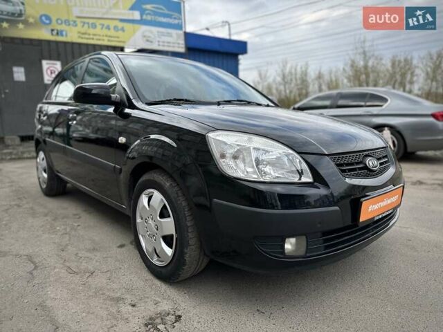 Черный Киа Рио, объемом двигателя 1.4 л и пробегом 233 тыс. км за 5900 $, фото 38 на Automoto.ua