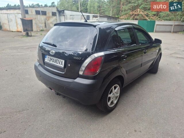 Чорний Кіа Ріо, об'ємом двигуна 1.6 л та пробігом 228 тис. км за 5500 $, фото 4 на Automoto.ua