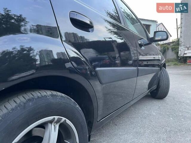Черный Киа Рио, объемом двигателя 1.4 л и пробегом 265 тыс. км за 3900 $, фото 1 на Automoto.ua