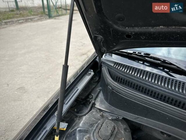 Черный Киа Рио, объемом двигателя 1.4 л и пробегом 233 тыс. км за 5900 $, фото 53 на Automoto.ua