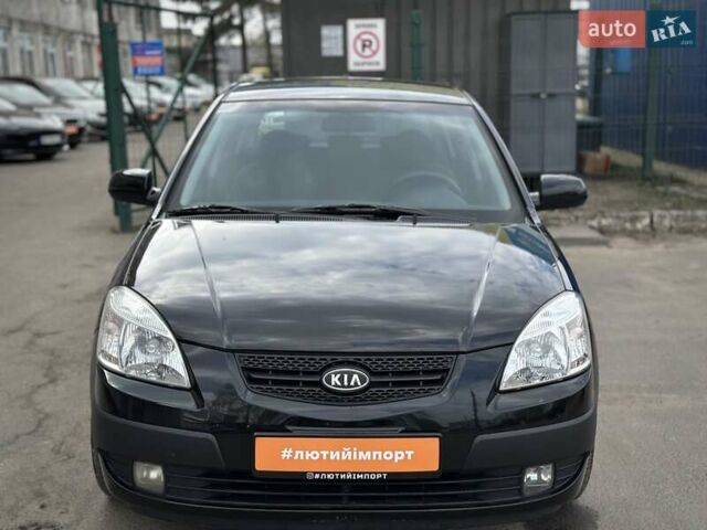 Черный Киа Рио, объемом двигателя 1.4 л и пробегом 233 тыс. км за 5900 $, фото 26 на Automoto.ua