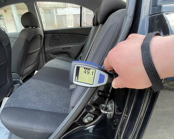 Черный Киа Рио, объемом двигателя 1.4 л и пробегом 233 тыс. км за 5900 $, фото 5 на Automoto.ua