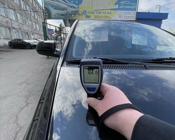 Черный Киа Рио, объемом двигателя 1.4 л и пробегом 233 тыс. км за 5900 $, фото 13 на Automoto.ua