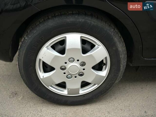 Черный Киа Рио, объемом двигателя 1.4 л и пробегом 233 тыс. км за 5900 $, фото 73 на Automoto.ua