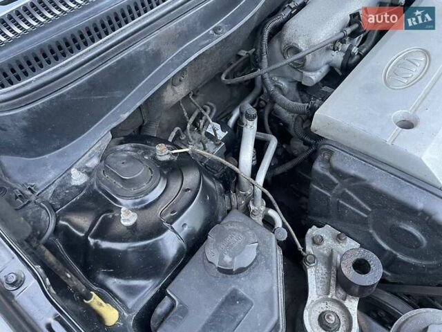 Черный Киа Рио, объемом двигателя 1.4 л и пробегом 265 тыс. км за 3900 $, фото 18 на Automoto.ua