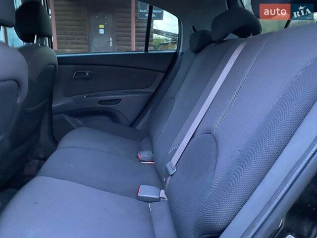 Чорний Кіа Ріо, об'ємом двигуна 1.6 л та пробігом 198 тис. км за 3699 $, фото 23 на Automoto.ua