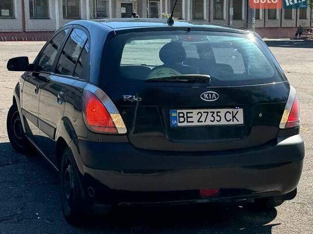 Черный Киа Рио, объемом двигателя 1.4 л и пробегом 350 тыс. км за 4200 $, фото 1 на Automoto.ua
