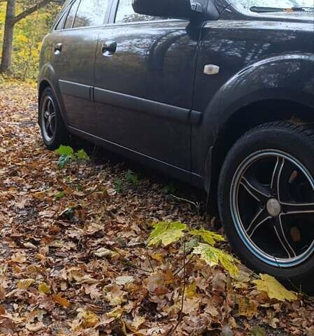 Черный Киа Рио, объемом двигателя 1.4 л и пробегом 350 тыс. км за 4200 $, фото 9 на Automoto.ua