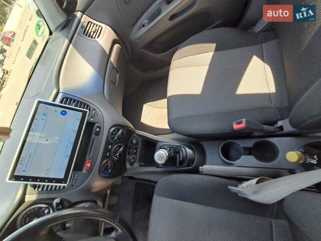 Черный Киа Рио, объемом двигателя 1.6 л и пробегом 164 тыс. км за 5400 $, фото 6 на Automoto.ua