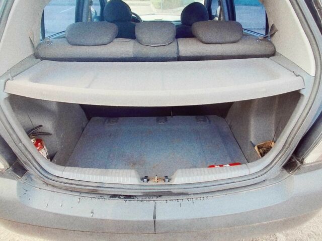 Черный Киа Рио, объемом двигателя 1.4 л и пробегом 132 тыс. км за 4000 $, фото 6 на Automoto.ua