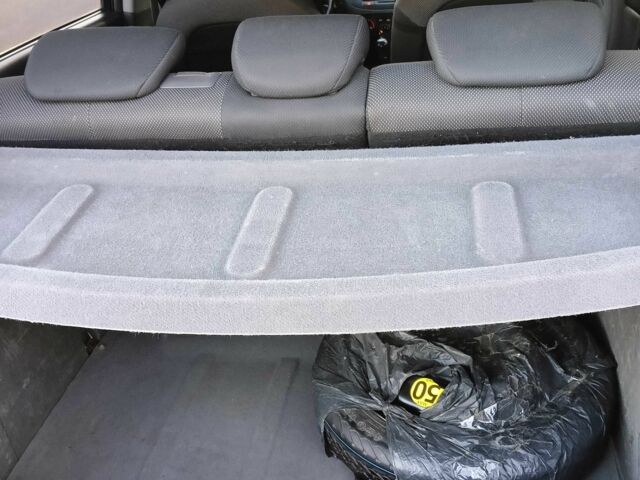 Черный Киа Рио, объемом двигателя 1.4 л и пробегом 297 тыс. км за 4500 $, фото 8 на Automoto.ua