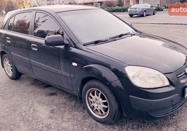 Черный Киа Рио, объемом двигателя 1.4 л и пробегом 132 тыс. км за 4000 $, фото 1 на Automoto.ua
