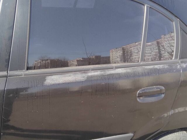 Черный Киа Рио, объемом двигателя 1.4 л и пробегом 132 тыс. км за 4000 $, фото 9 на Automoto.ua