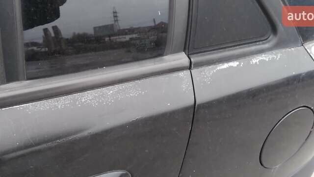 Чорний Кіа Ріо, об'ємом двигуна 1.4 л та пробігом 132 тис. км за 4000 $, фото 7 на Automoto.ua