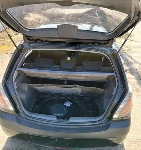 Черный Киа Рио, объемом двигателя 1.4 л и пробегом 297 тыс. км за 4300 $, фото 6 на Automoto.ua