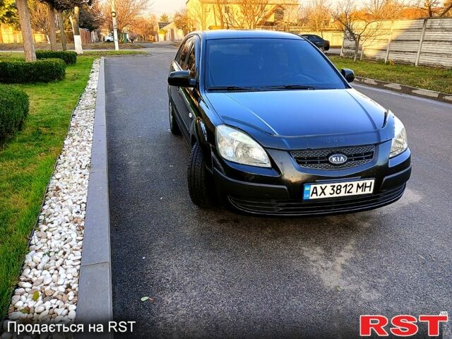 Чорний Кіа Ріо, об'ємом двигуна 1.4 л та пробігом 297 тис. км за 4500 $, фото 2 на Automoto.ua