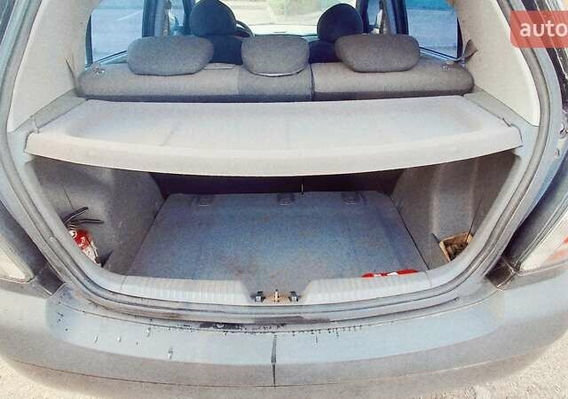Черный Киа Рио, объемом двигателя 1.4 л и пробегом 132 тыс. км за 4000 $, фото 9 на Automoto.ua