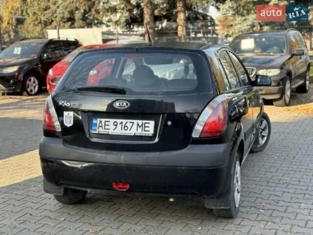 Черный Киа Рио, объемом двигателя 1.6 л и пробегом 256 тыс. км за 3300 $, фото 1 на Automoto.ua