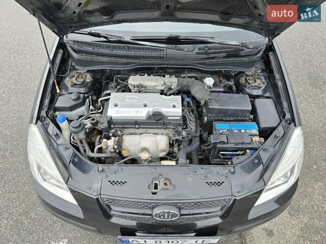 Черный Киа Рио, объемом двигателя 1.4 л и пробегом 250 тыс. км за 4300 $, фото 21 на Automoto.ua