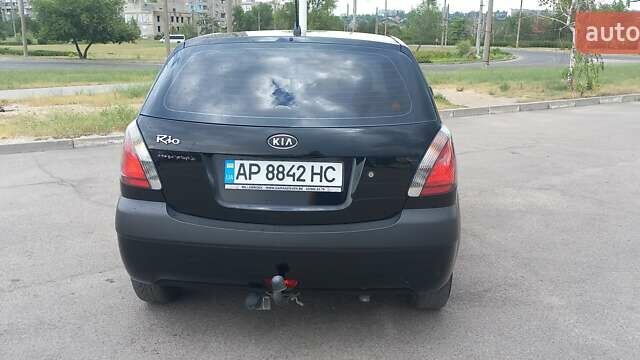 Черный Киа Рио, объемом двигателя 1.4 л и пробегом 144 тыс. км за 4400 $, фото 3 на Automoto.ua