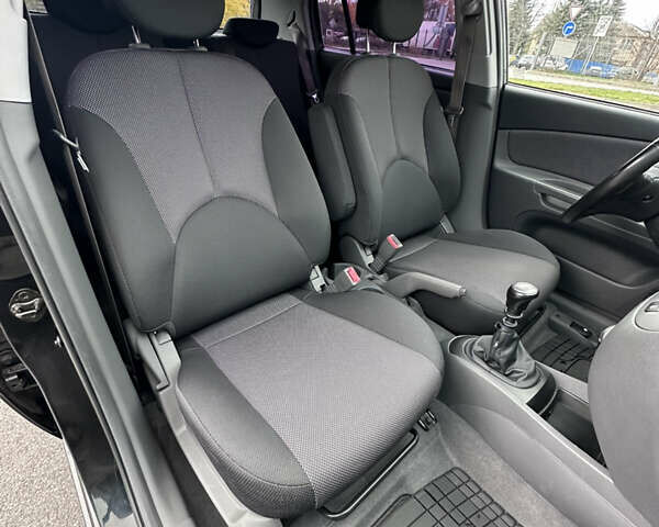 Черный Киа Рио, объемом двигателя 1.4 л и пробегом 158 тыс. км за 5000 $, фото 33 на Automoto.ua