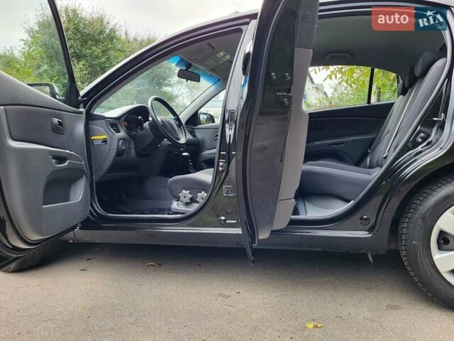 Черный Киа Рио, объемом двигателя 1.4 л и пробегом 184 тыс. км за 4999 $, фото 51 на Automoto.ua