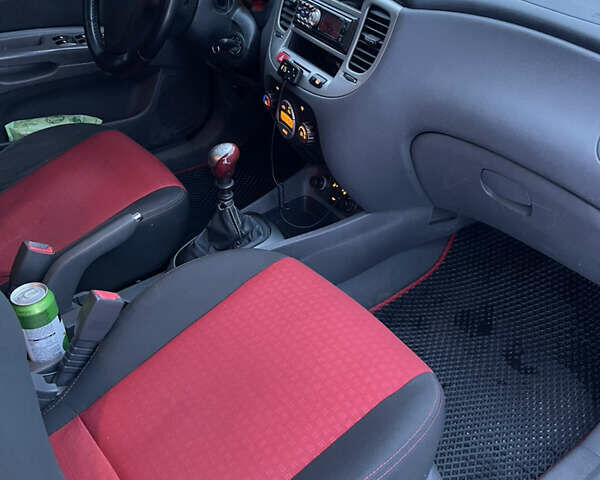 Черный Киа Рио, объемом двигателя 1.6 л и пробегом 233 тыс. км за 4199 $, фото 23 на Automoto.ua