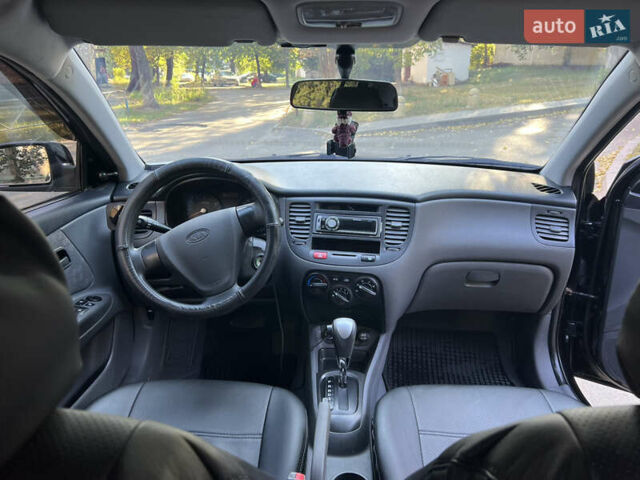 Чорний Кіа Ріо, об'ємом двигуна 1.4 л та пробігом 215 тис. км за 6200 $, фото 13 на Automoto.ua
