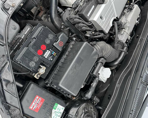 Черный Киа Рио, объемом двигателя 1.4 л и пробегом 158 тыс. км за 5000 $, фото 57 на Automoto.ua