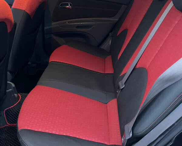 Черный Киа Рио, объемом двигателя 1.6 л и пробегом 233 тыс. км за 4199 $, фото 20 на Automoto.ua