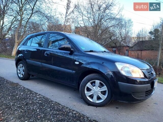 Чорний Кіа Ріо, об'ємом двигуна 1.4 л та пробігом 184 тис. км за 4800 $, фото 26 на Automoto.ua