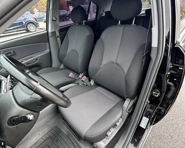 Черный Киа Рио, объемом двигателя 1.4 л и пробегом 158 тыс. км за 5000 $, фото 25 на Automoto.ua