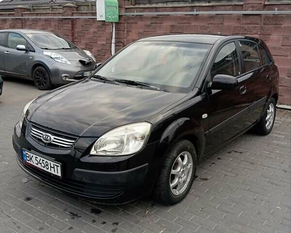 Черный Киа Рио, объемом двигателя 1.4 л и пробегом 203 тыс. км за 4499 $, фото 26 на Automoto.ua