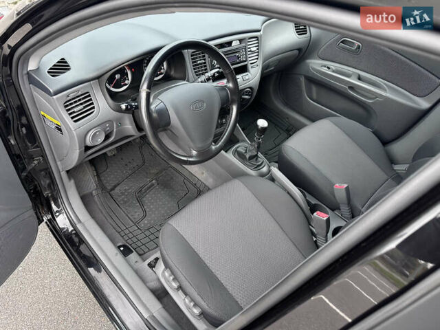 Черный Киа Рио, объемом двигателя 1.4 л и пробегом 158 тыс. км за 5000 $, фото 26 на Automoto.ua