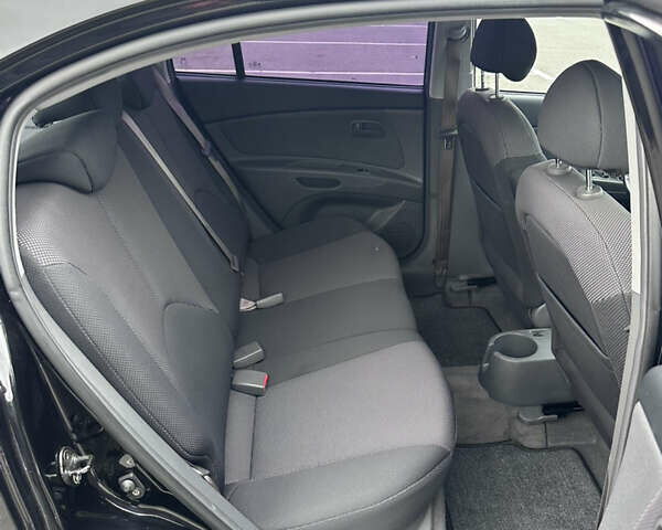 Черный Киа Рио, объемом двигателя 1.4 л и пробегом 158 тыс. км за 5000 $, фото 50 на Automoto.ua