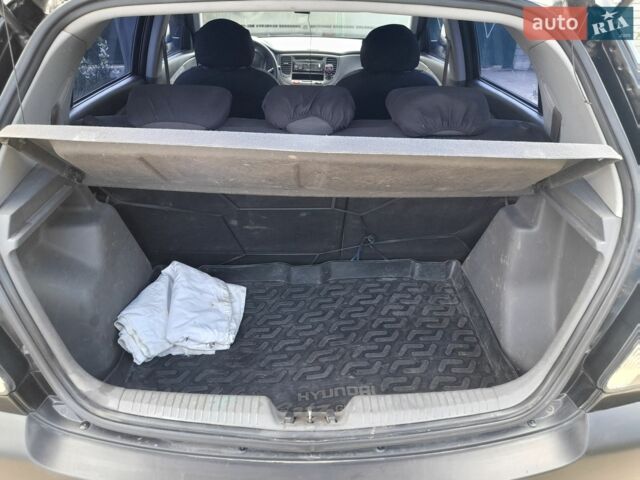 Черный Киа Рио, объемом двигателя 1.4 л и пробегом 220 тыс. км за 4500 $, фото 4 на Automoto.ua