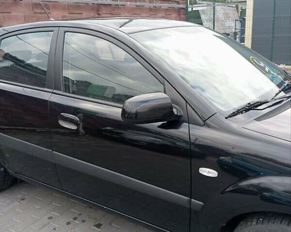 Черный Киа Рио, объемом двигателя 1.4 л и пробегом 203 тыс. км за 4499 $, фото 20 на Automoto.ua